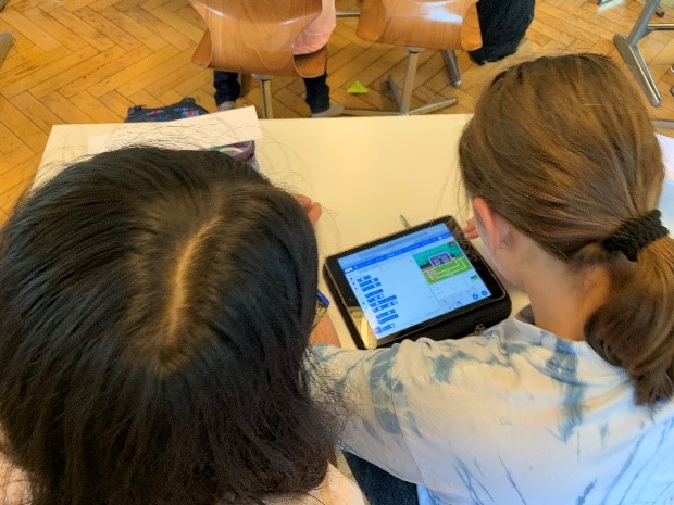 Pupils working on Scratch