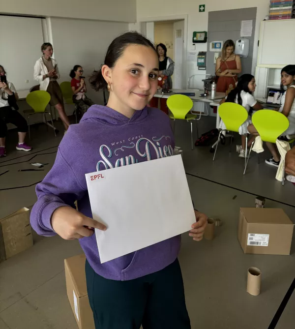 A girl holding a certificate