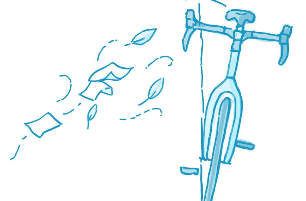 A gust of wind pushes a bicycle off balance, but it returns to the upright position. 