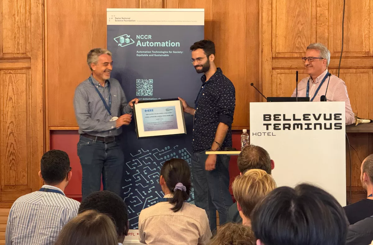 Panos receives his award