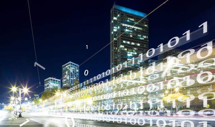 Symbolic image of binary code streaming along a city road