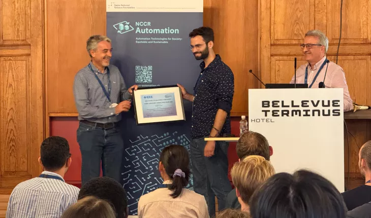 Panos receives his award