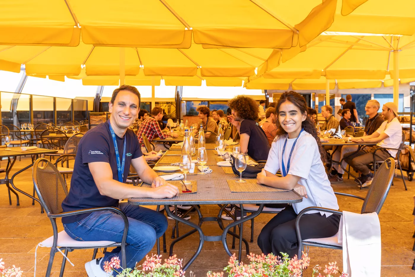 People sitting on a terrace eating lunch